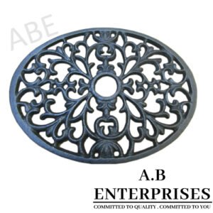 Handcrafted cast iron kitchen trivet in natural iron patina finish by A.B. Enterprises – durable and stylish kitchen accessory